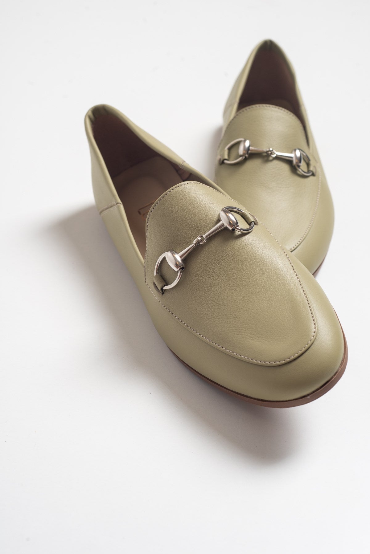 Penny - Olive Green Leather Horsebit Loafers – front three-quarter view showing leather, suede, green, Vowalisse