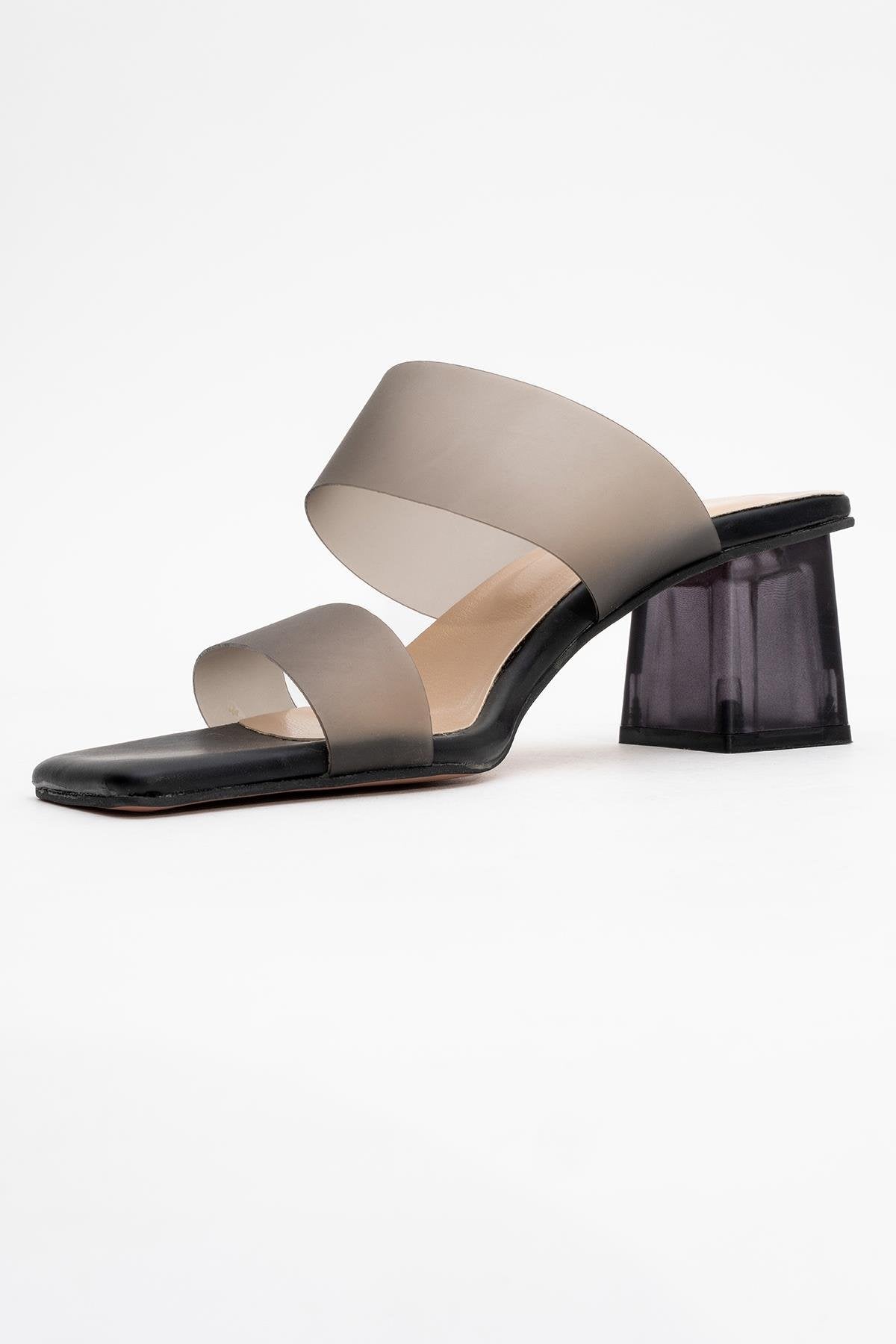 Elara Black Transparent Strap Sandal – heel view showing leather, black, Vowalisse