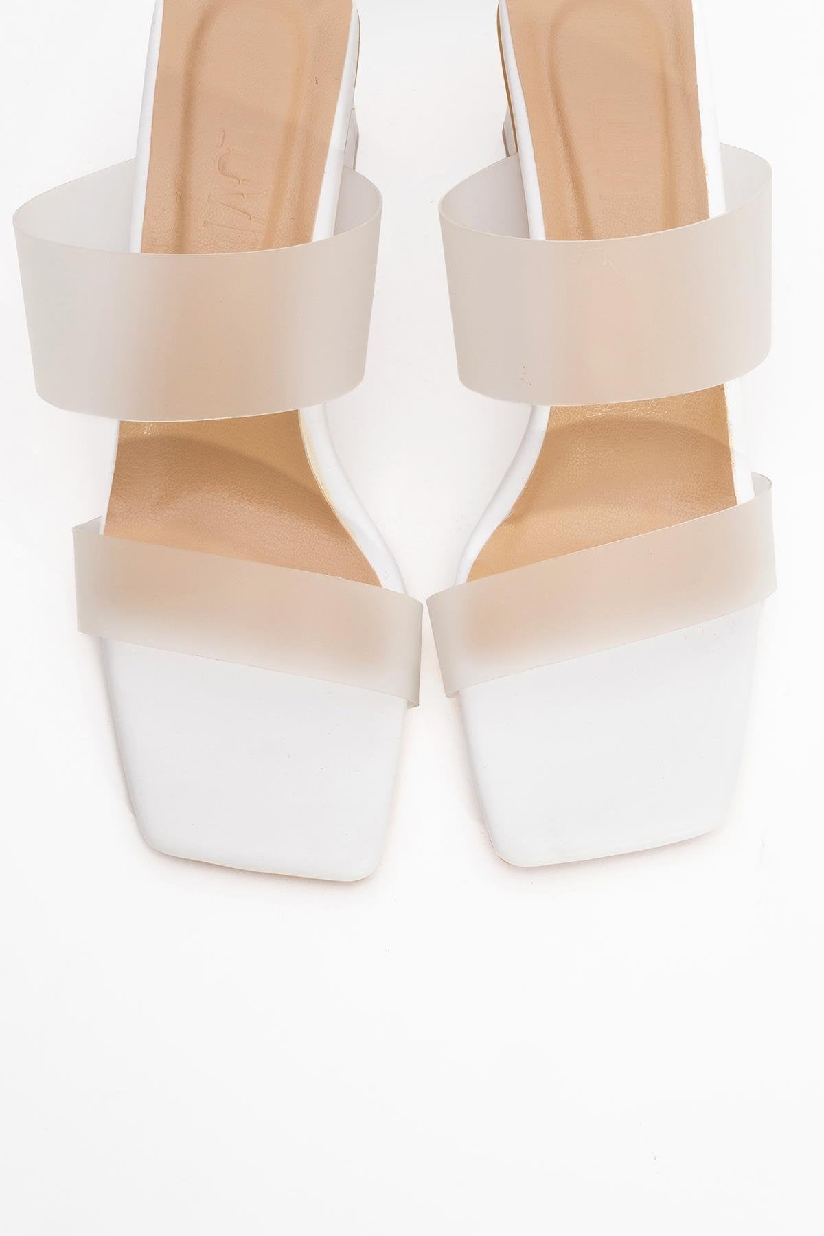 Elara White Transparent Strap Sandal – side view showing leather, white, Vowalisse