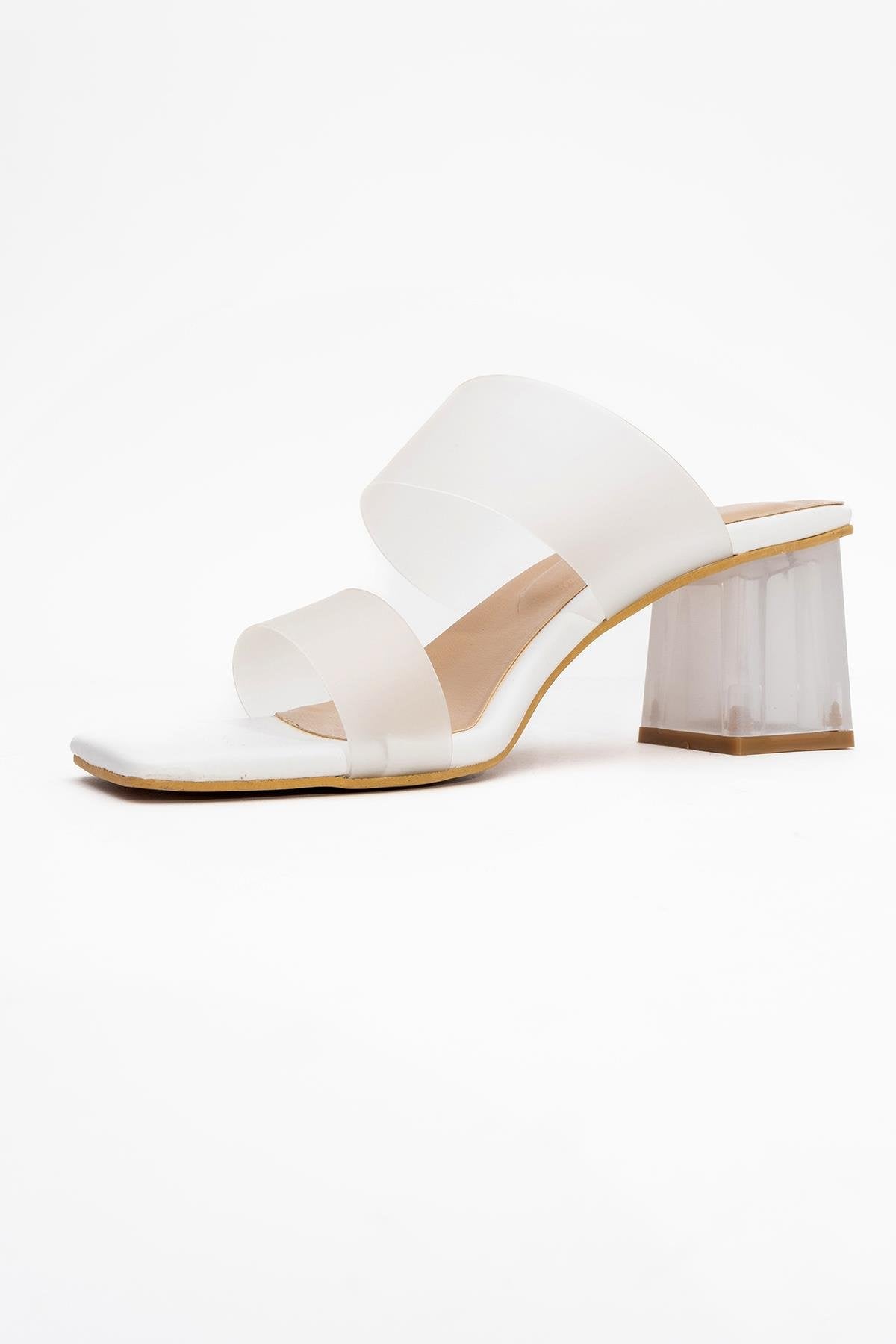 Elara White Transparent Strap Sandal – heel view showing leather, white, Vowalisse