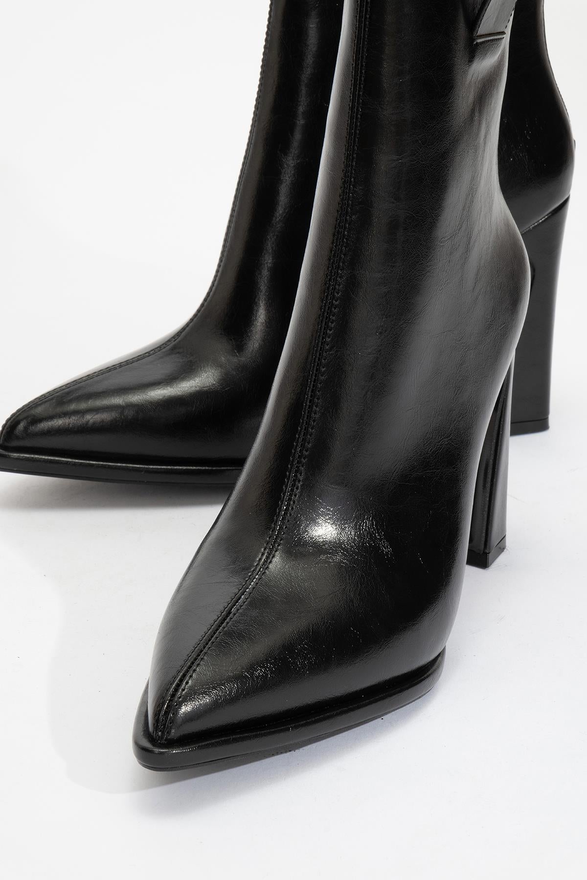 Aja - Black Block Heel Convertible Knee-High Boot – product view 10 showing leather, black, Vowalisse
