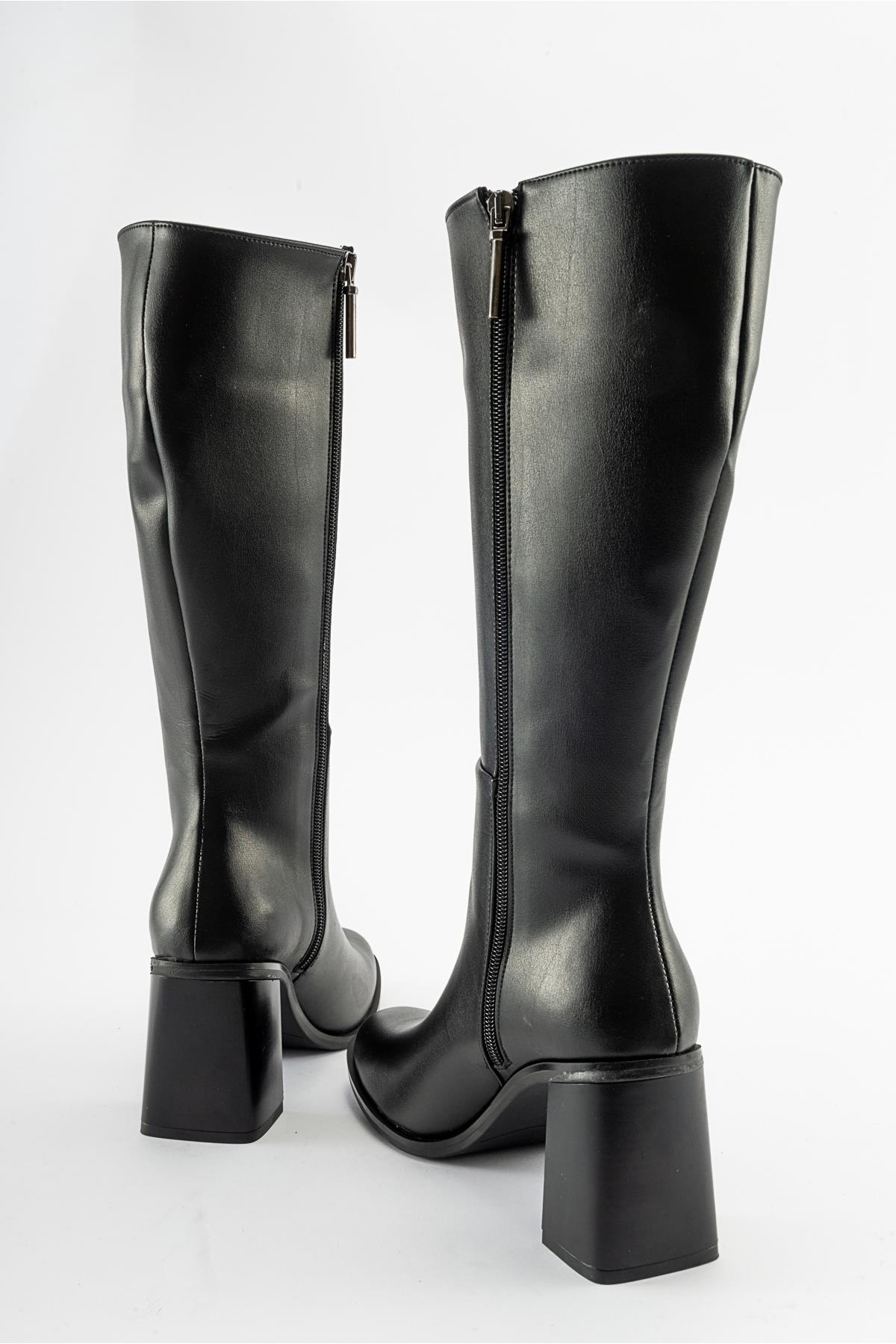 Maranta - Black Heeled Knee-High Boot – detail view showing leather, black, Vowalisse
