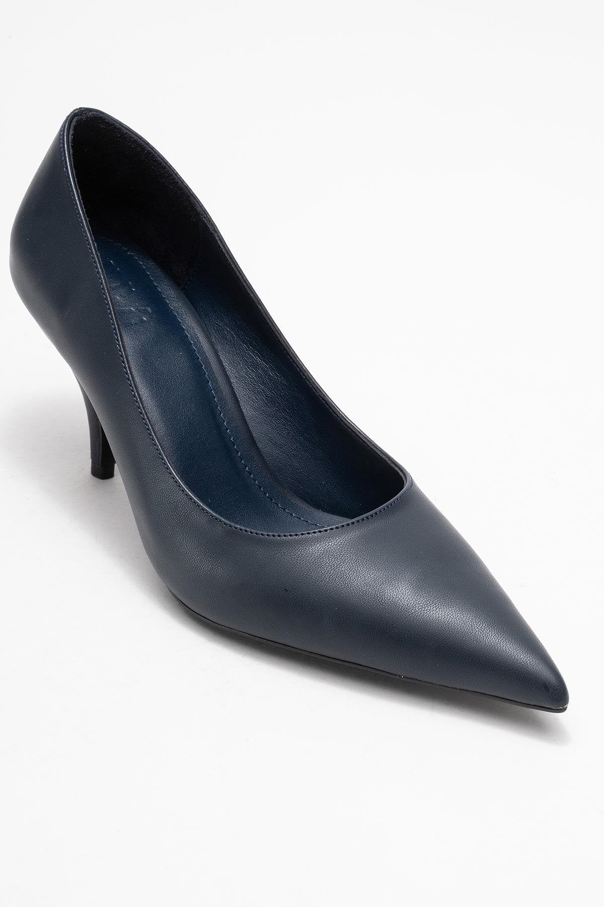 Marcus - Navy Heeled Pump – detail view showing leather, Vowalisse