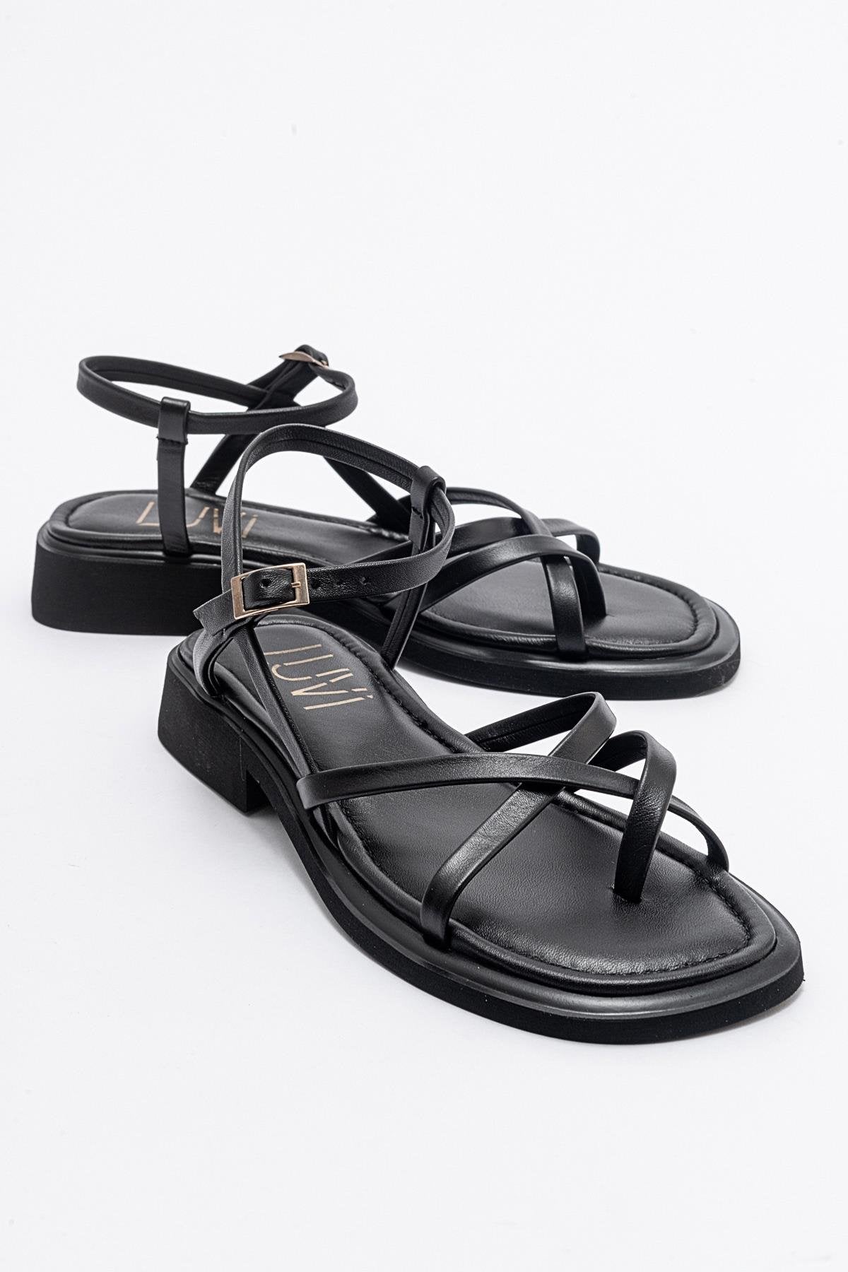 Antas - Black Leather Sandals – front three-quarter view showing leather, black, Vowalisse