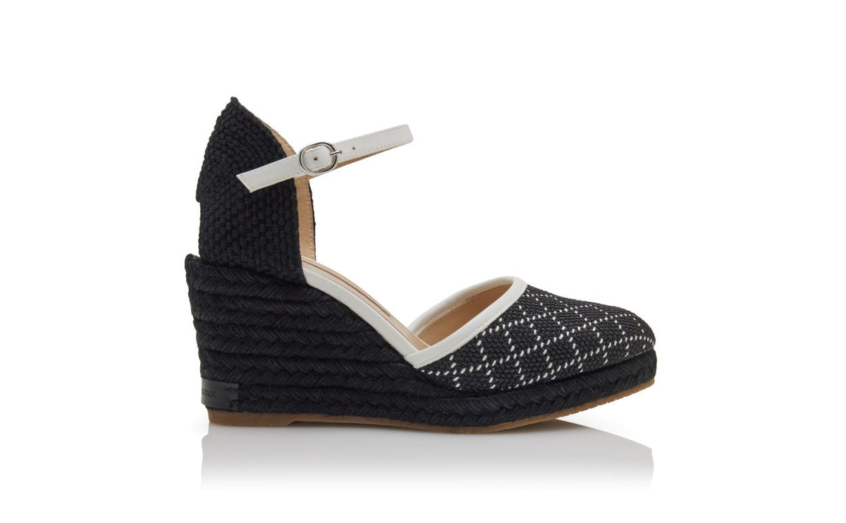 Elara Shine Black Ankle Strap Espadrilles – side profile showing black ankle strap, round toe, nappa leather, raffia…