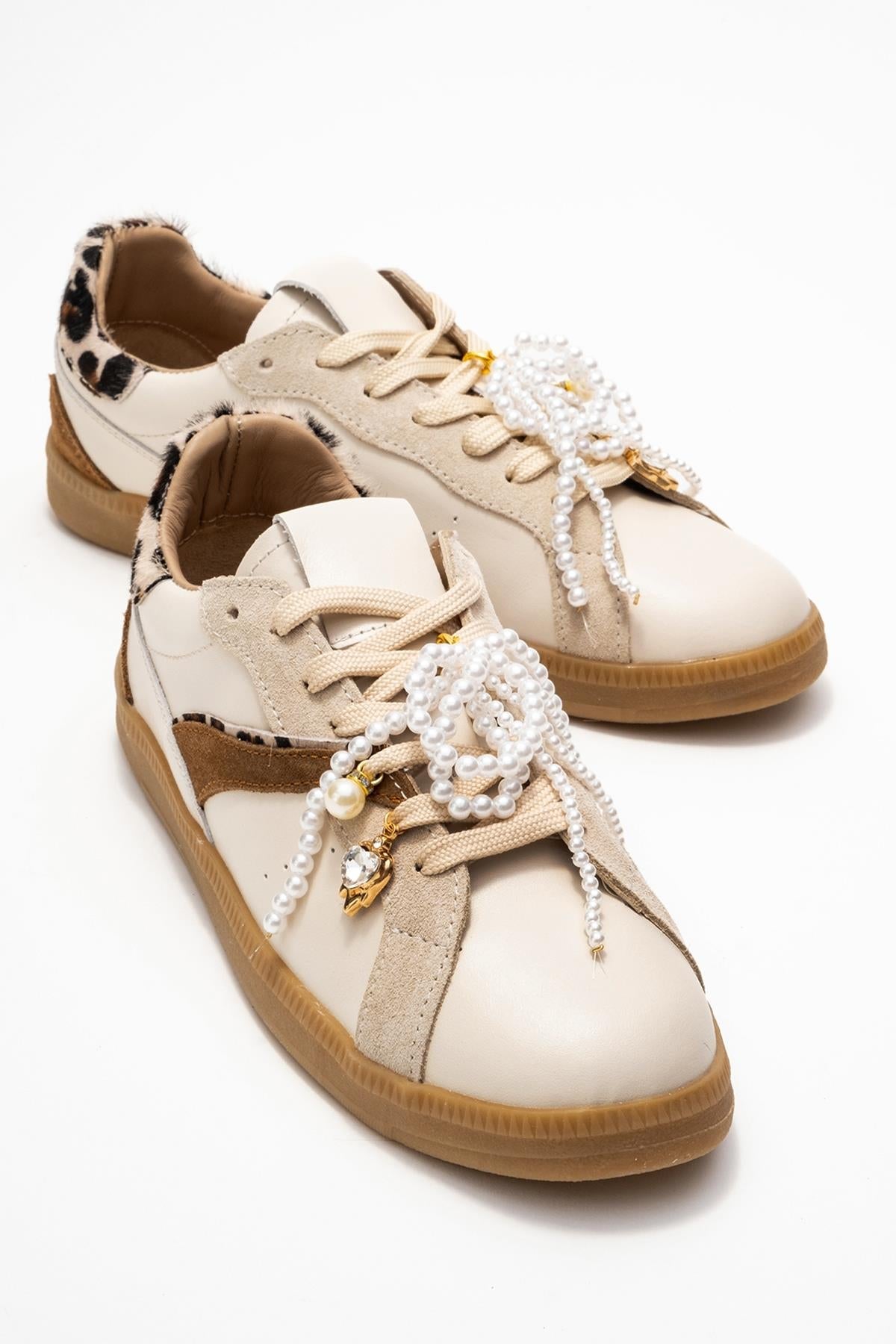 Taren - Beige Genuine Leather Pearl Buckle Casual Sneaker – front three-quarter view showing pearl, leather, Vowalisse