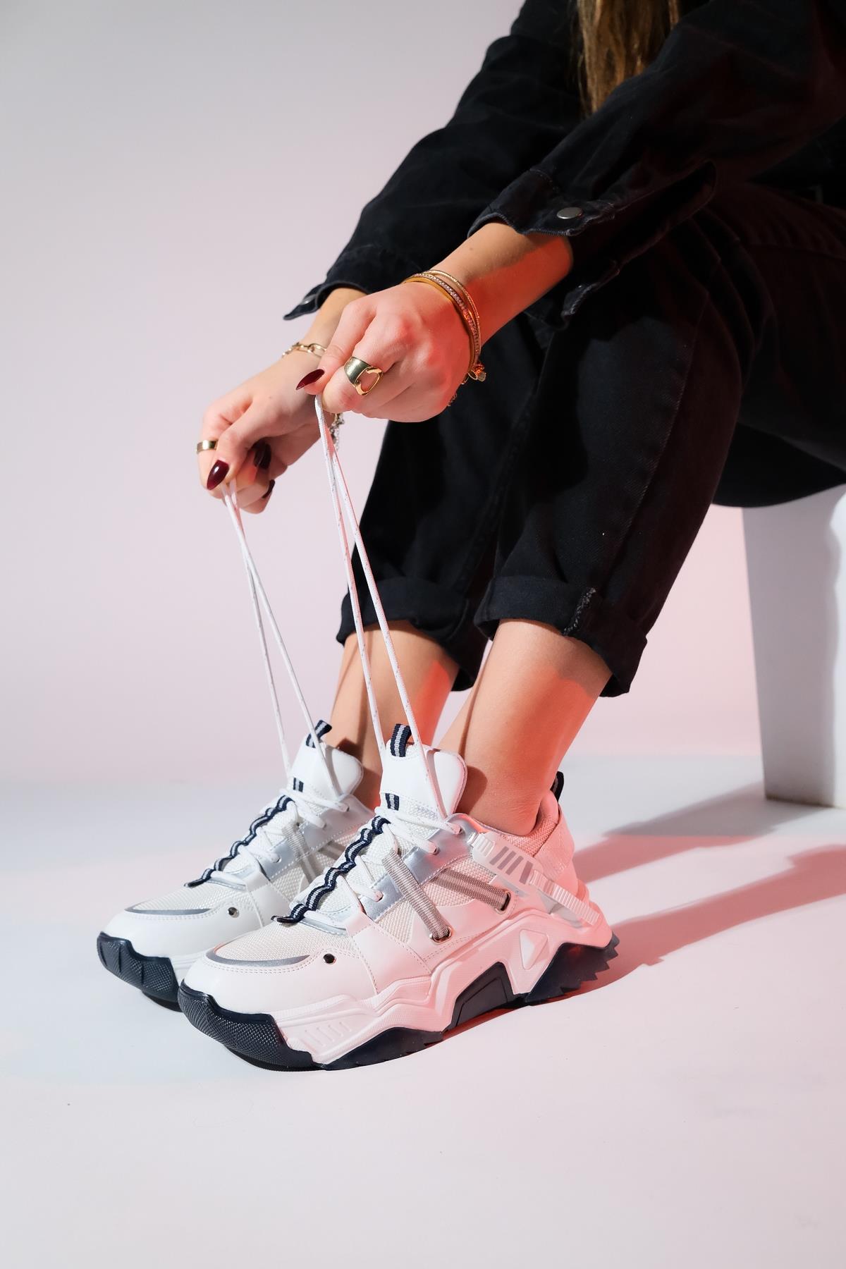 Maggie - White-Navy Sport Sneaker – front three-quarter view showing leather, white, Vowalisse