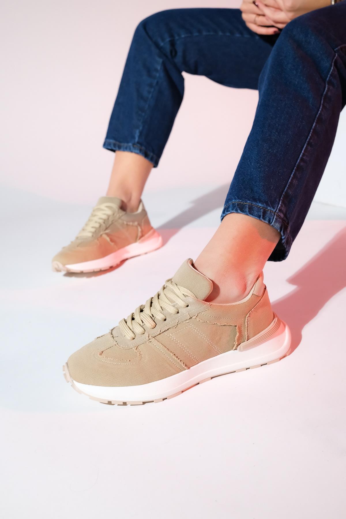 Rafael - Beige Denim Sport Sneaker – front three-quarter view showing leather, red, Vowalisse