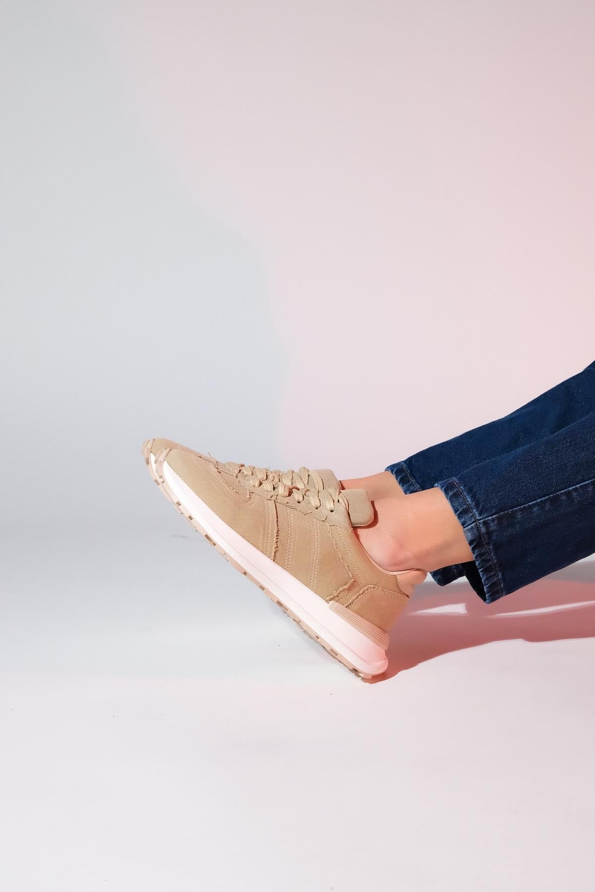 Rafael - Beige Denim Sport Sneaker – detail view showing leather, red, Vowalisse