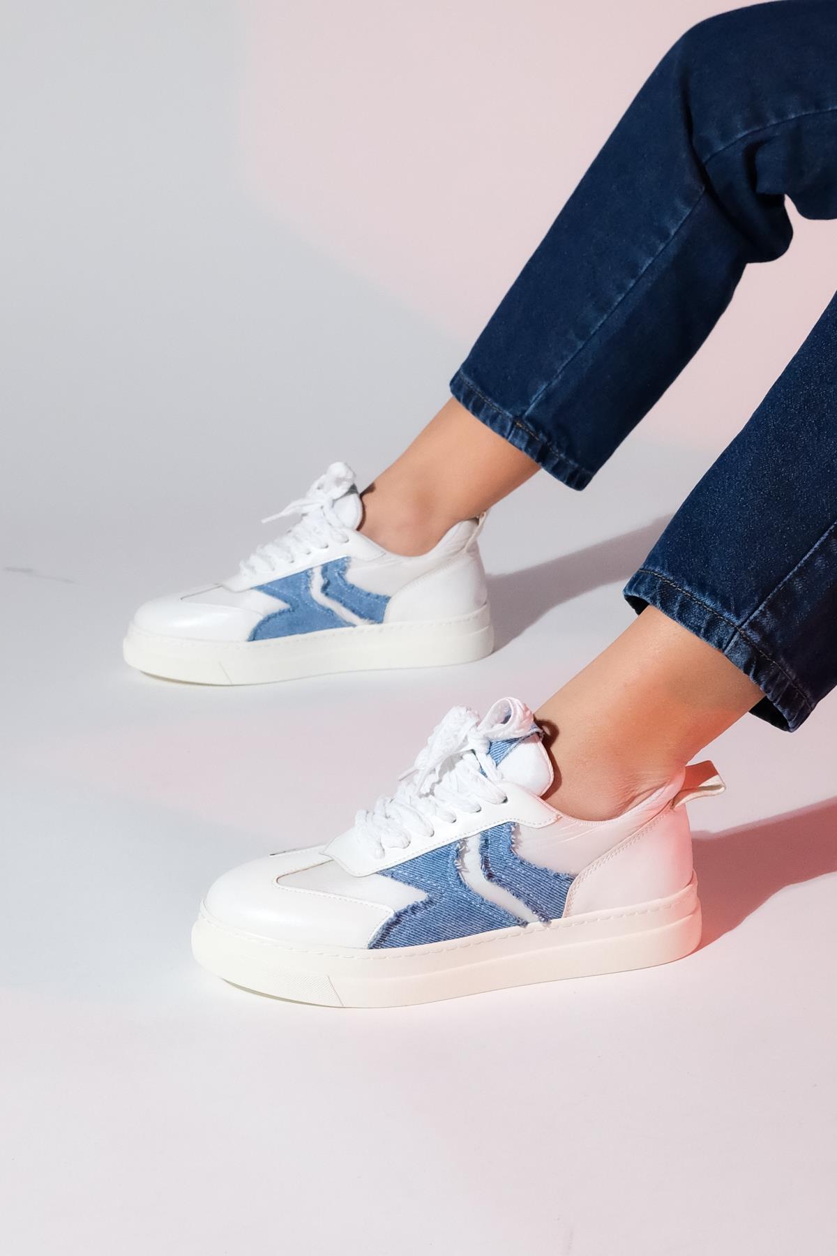 Sande - White Denim Detail Sport Sneaker – front three-quarter view showing leather, white, Vowalisse
