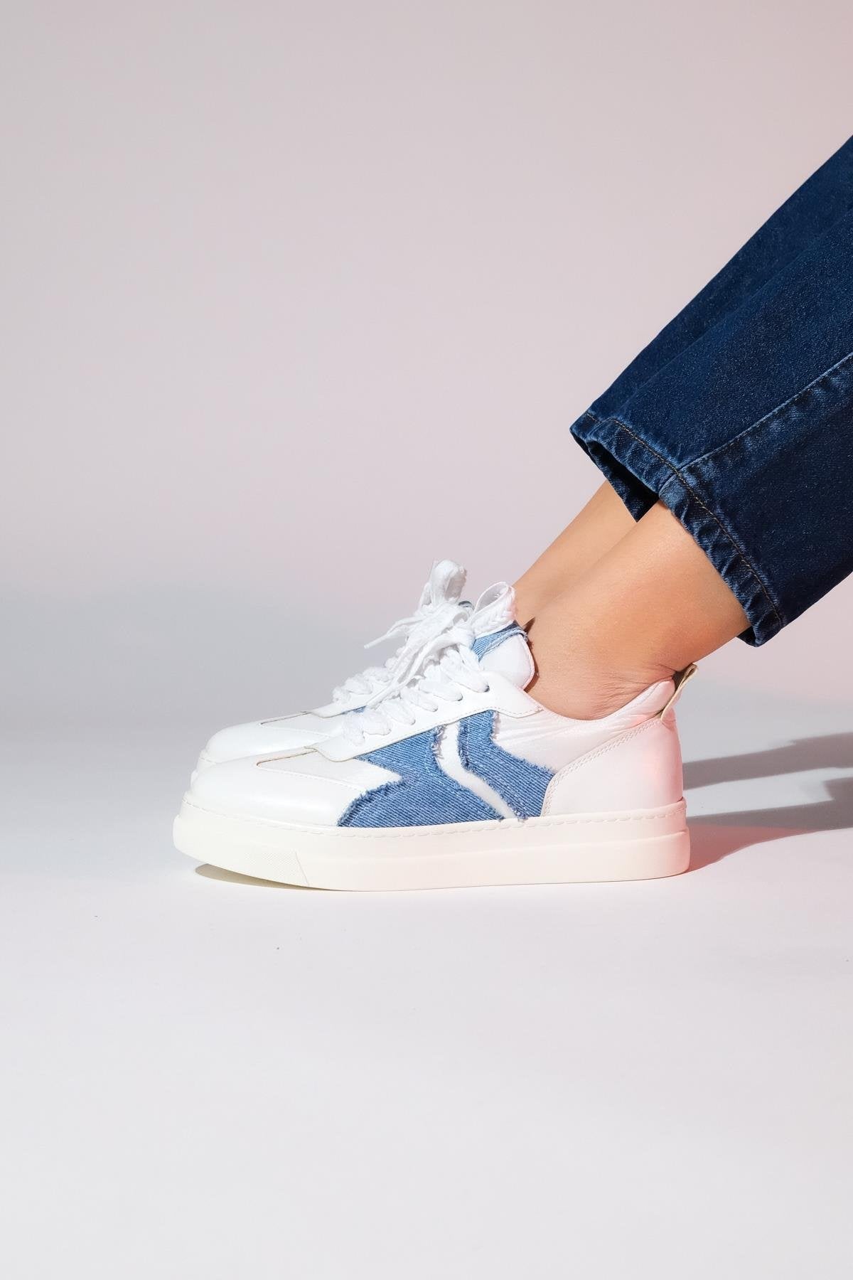 Sande - White Denim Detail Sport Sneaker – detail view showing leather, white, Vowalisse