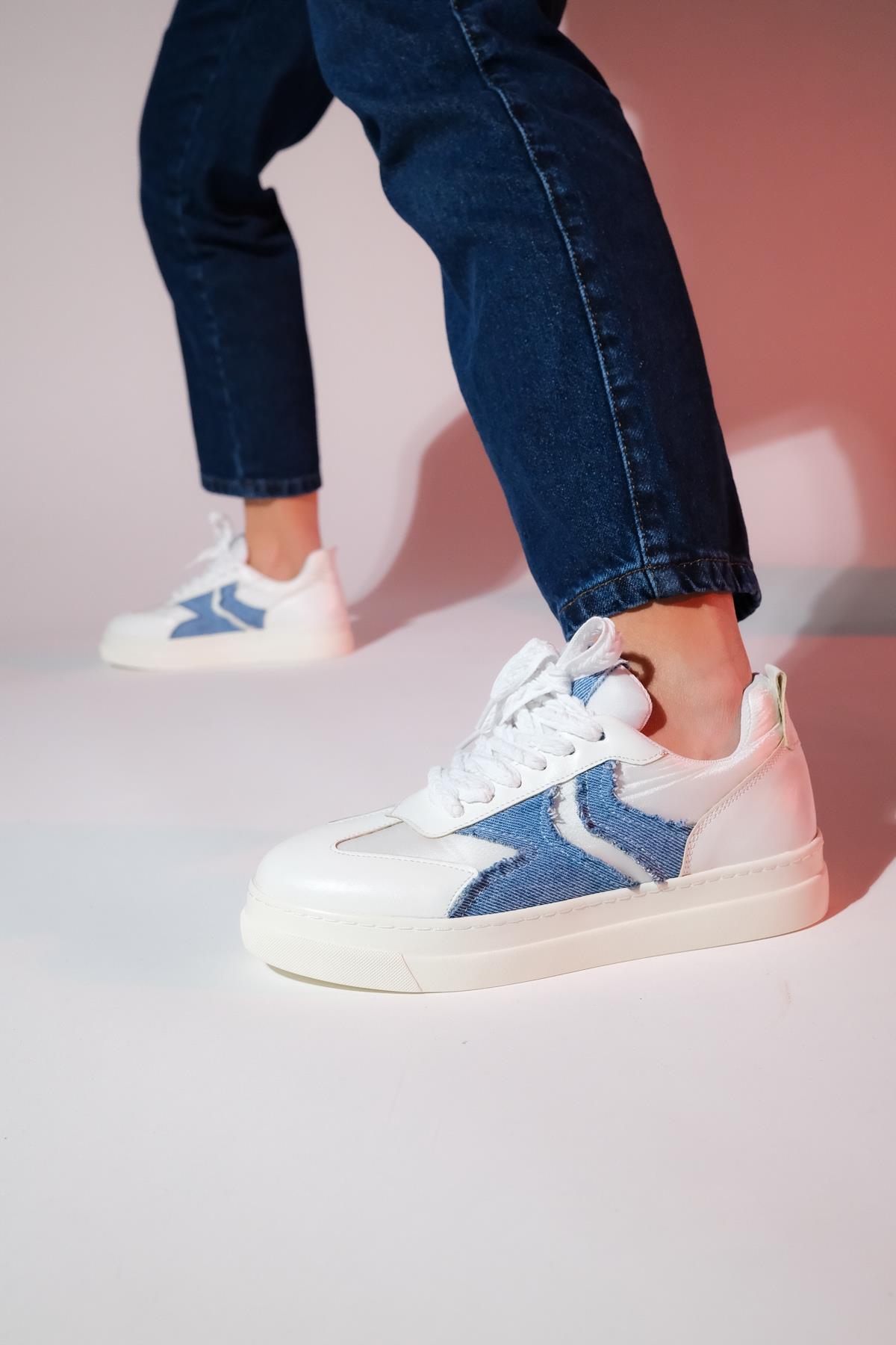 Sande - White Denim Detail Sport Sneaker – heel view showing leather, white, Vowalisse
