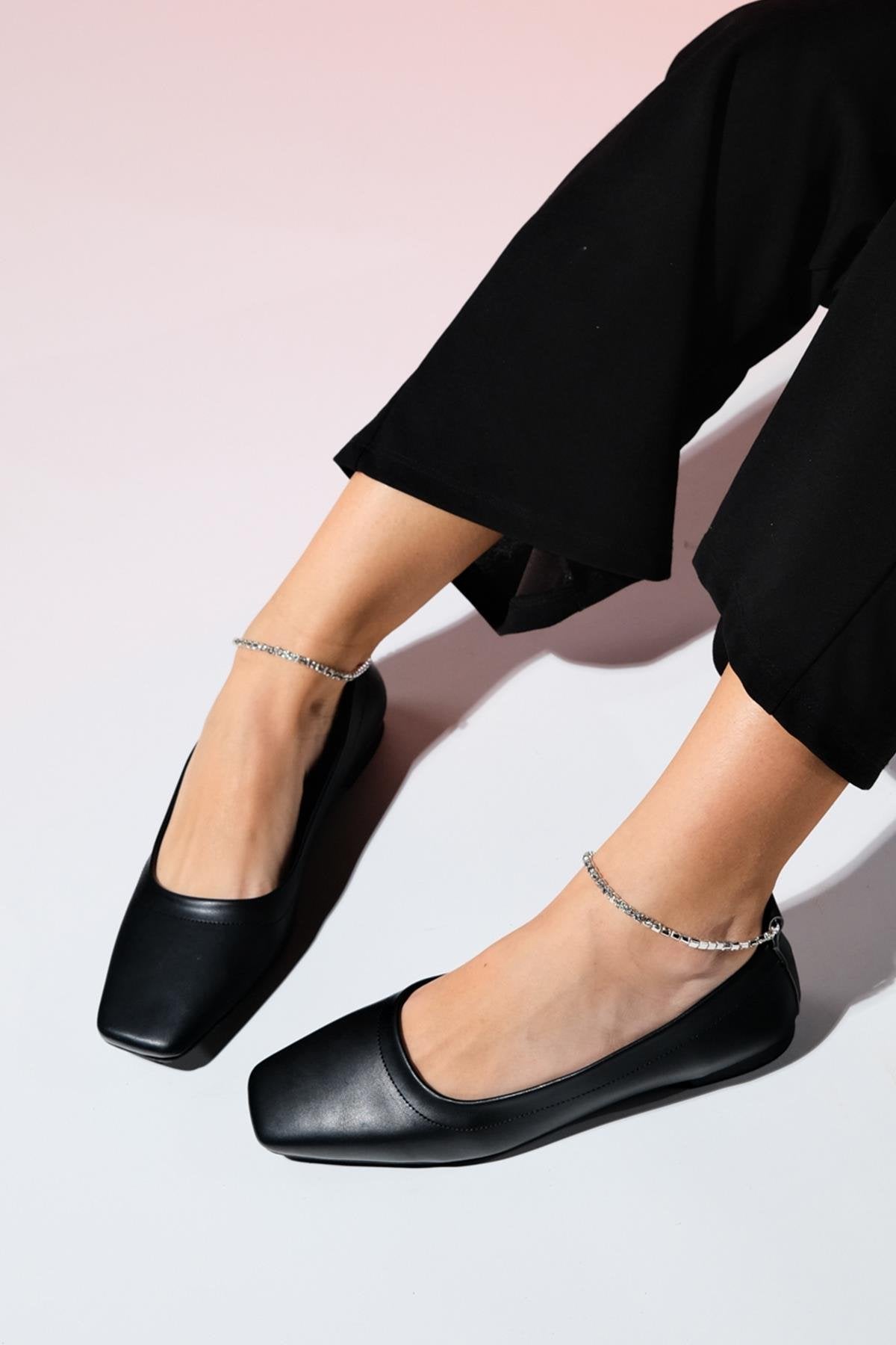 Pohan - Black Genuine Leather Stone-Embellished Ballet Flat – heel view showing leather, black, Vowalisse