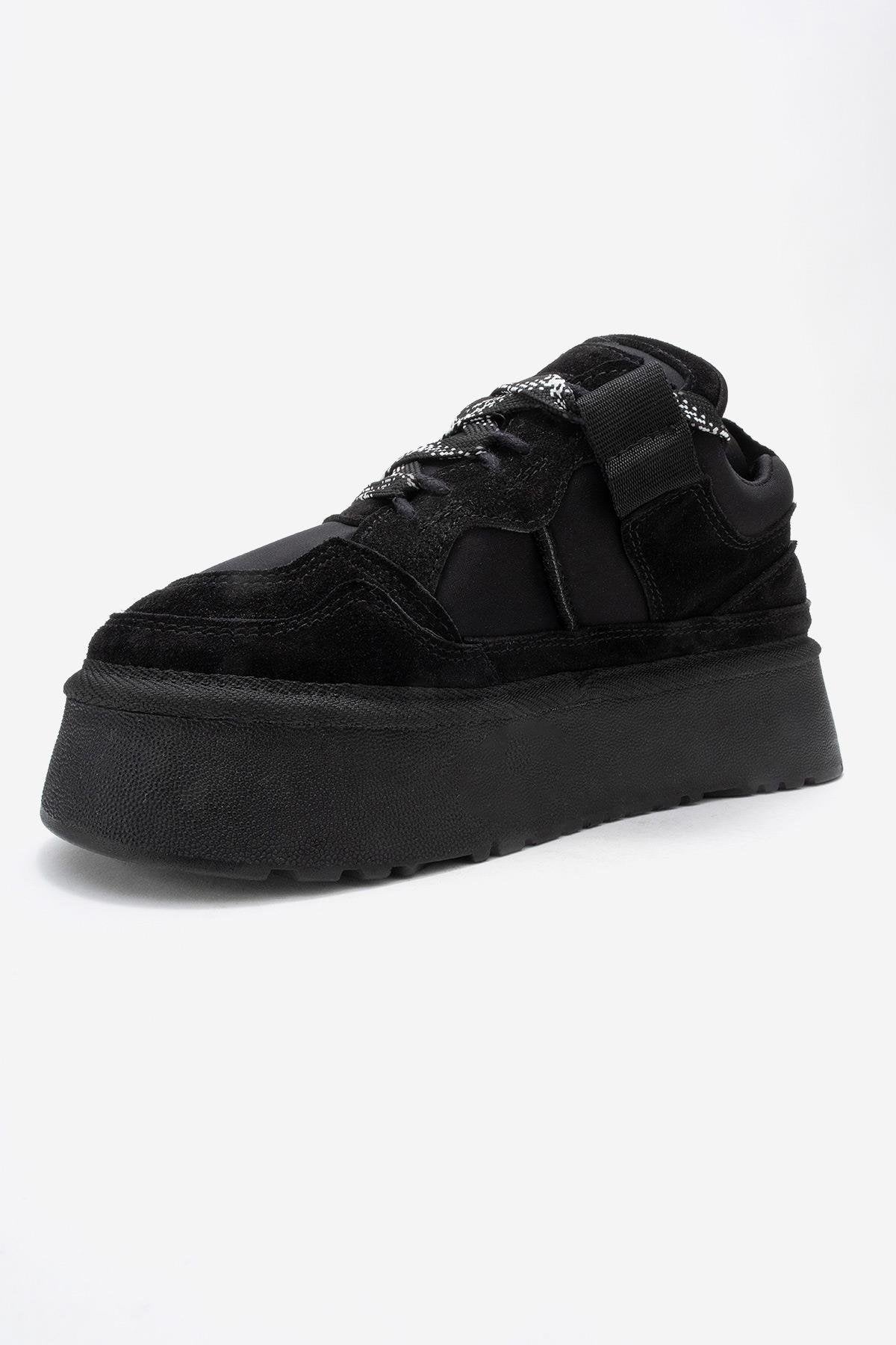 Riven - Black Genuine Leather Platform Sneaker – heel view showing leather, suede, black, Vowalisse