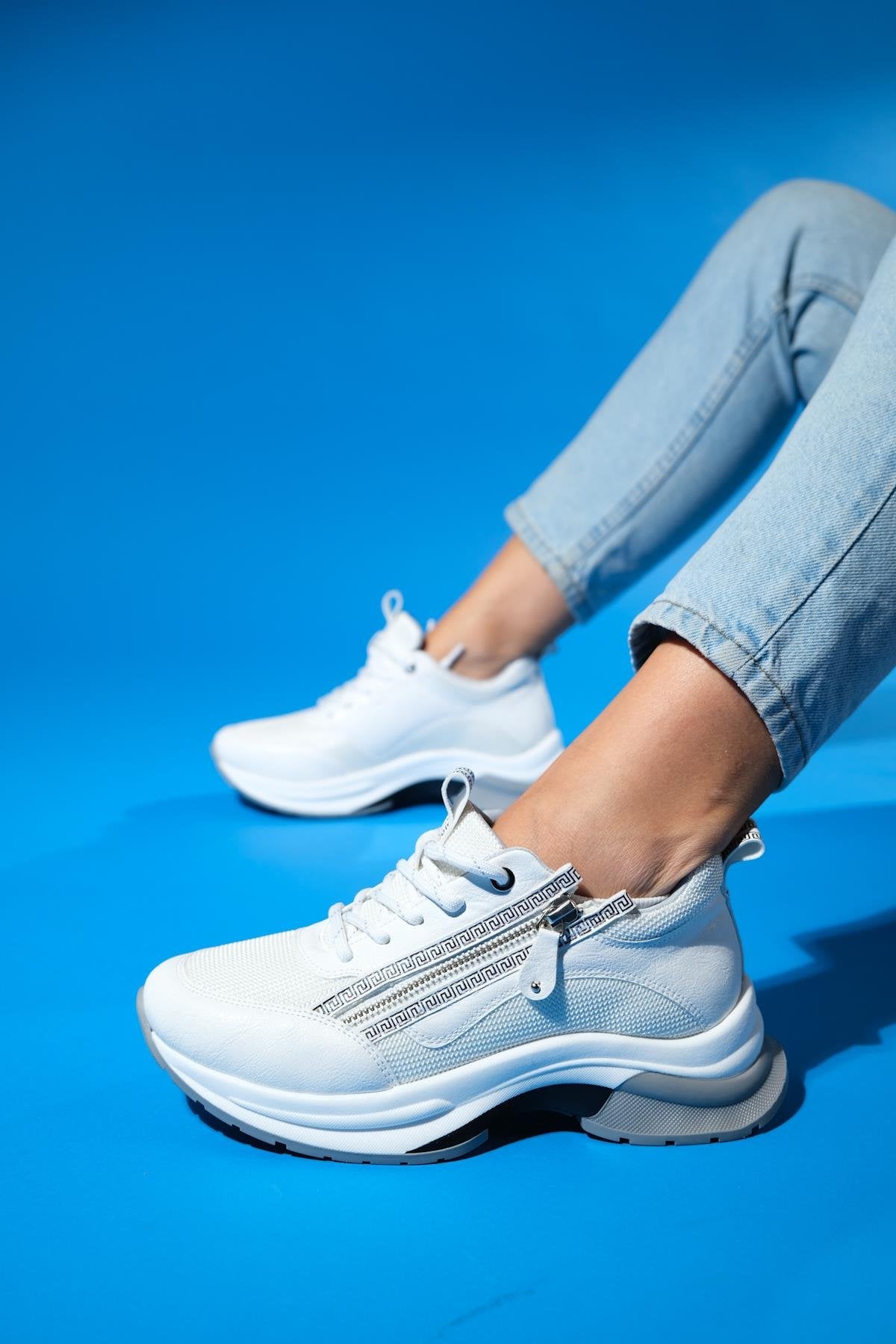 Oude - White Zip-Front Thick-Sole Sport Sneaker – front three-quarter view showing leather, white, Vowalisse