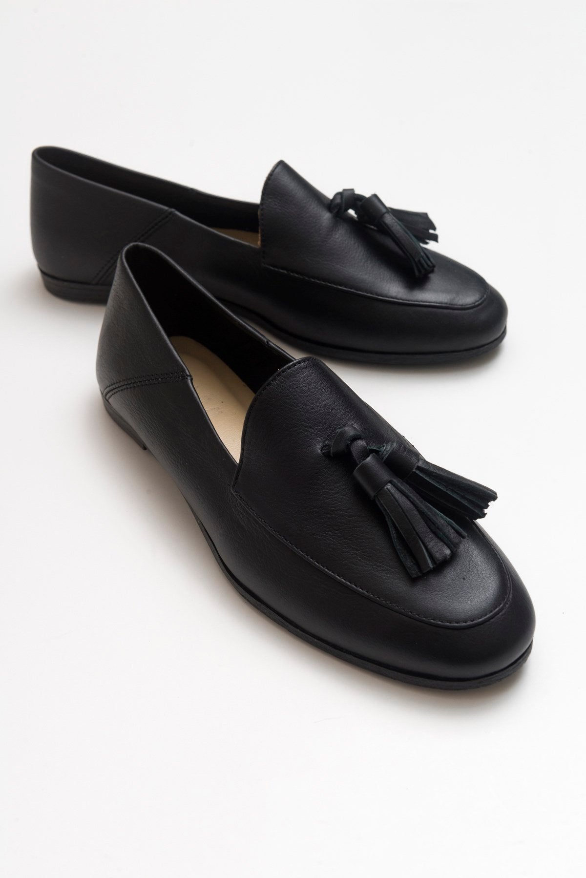 Mona - Black Soft Leather Tassel Loafers – front three-quarter view showing leather, suede, black, Vowalisse