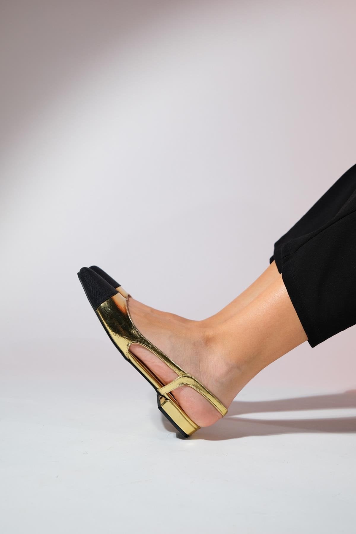 Lujo - Gold Backless Flat Ballerina – heel view showing leather, gold, Vowalisse
