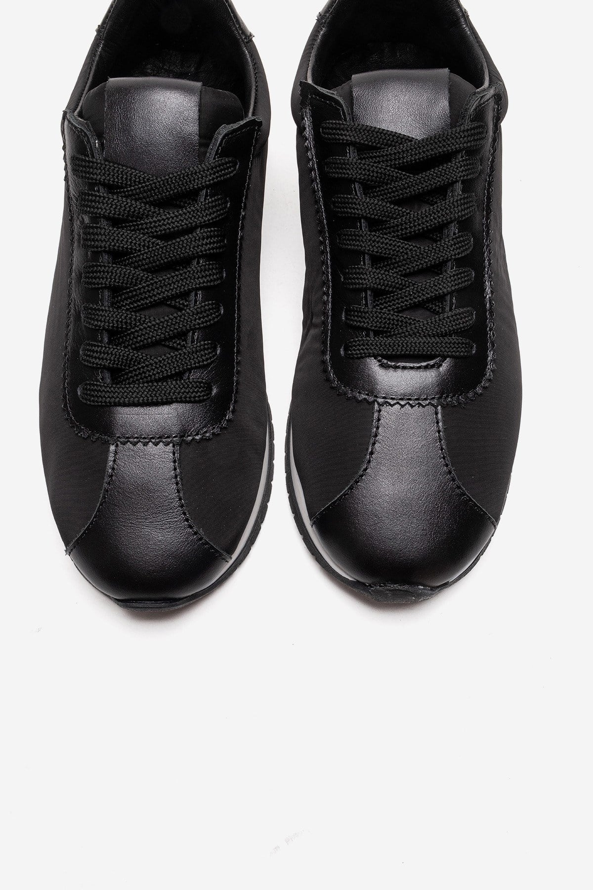 UNICA - Black Genuine Leather Sport Shoe – side view showing leather, suede, black, Vowalisse