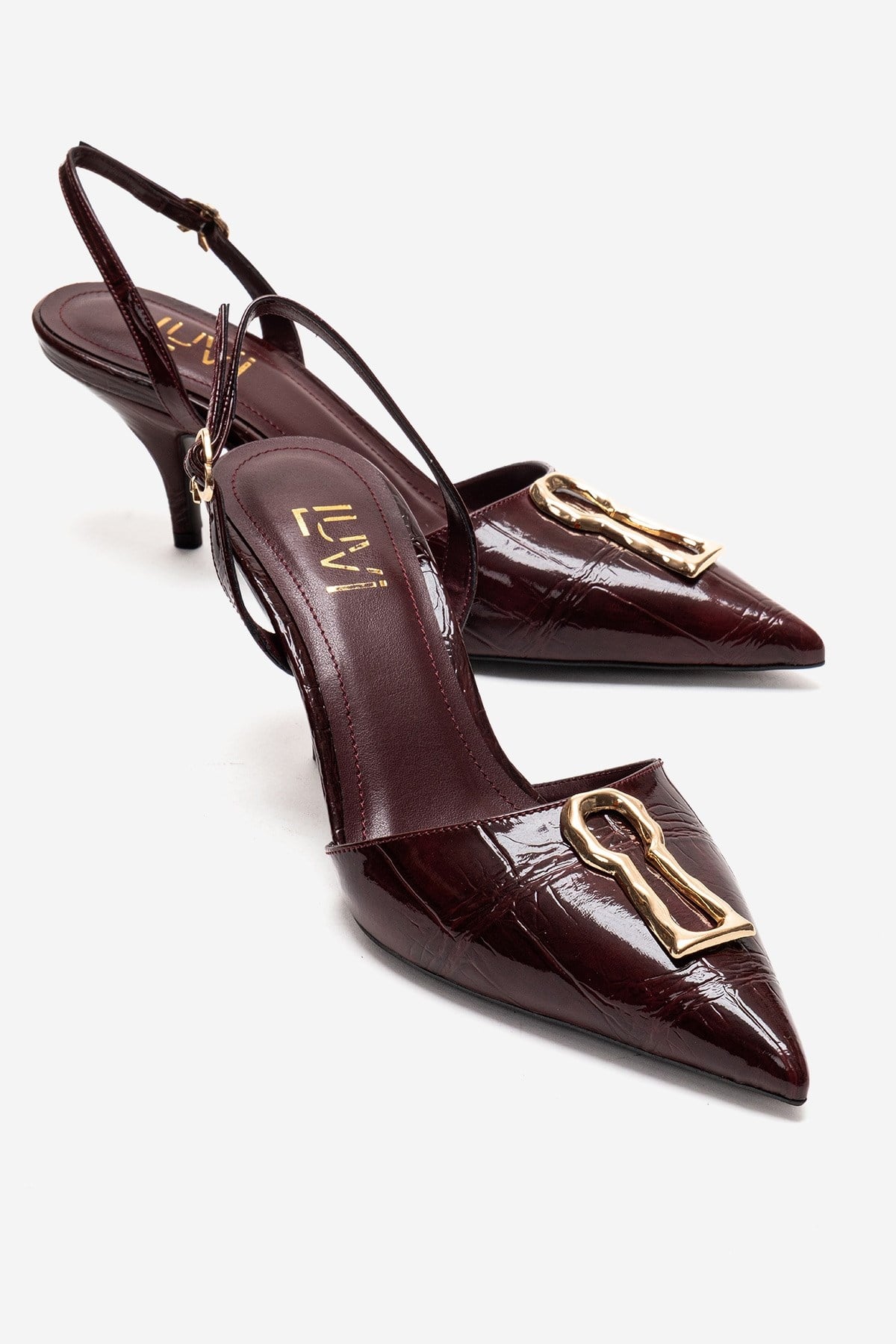 Yvella - Burgundy Patent Buckle Pointed Toe Stiletto Pump – front three-quarter view showing leather, metallic, Vowalisse