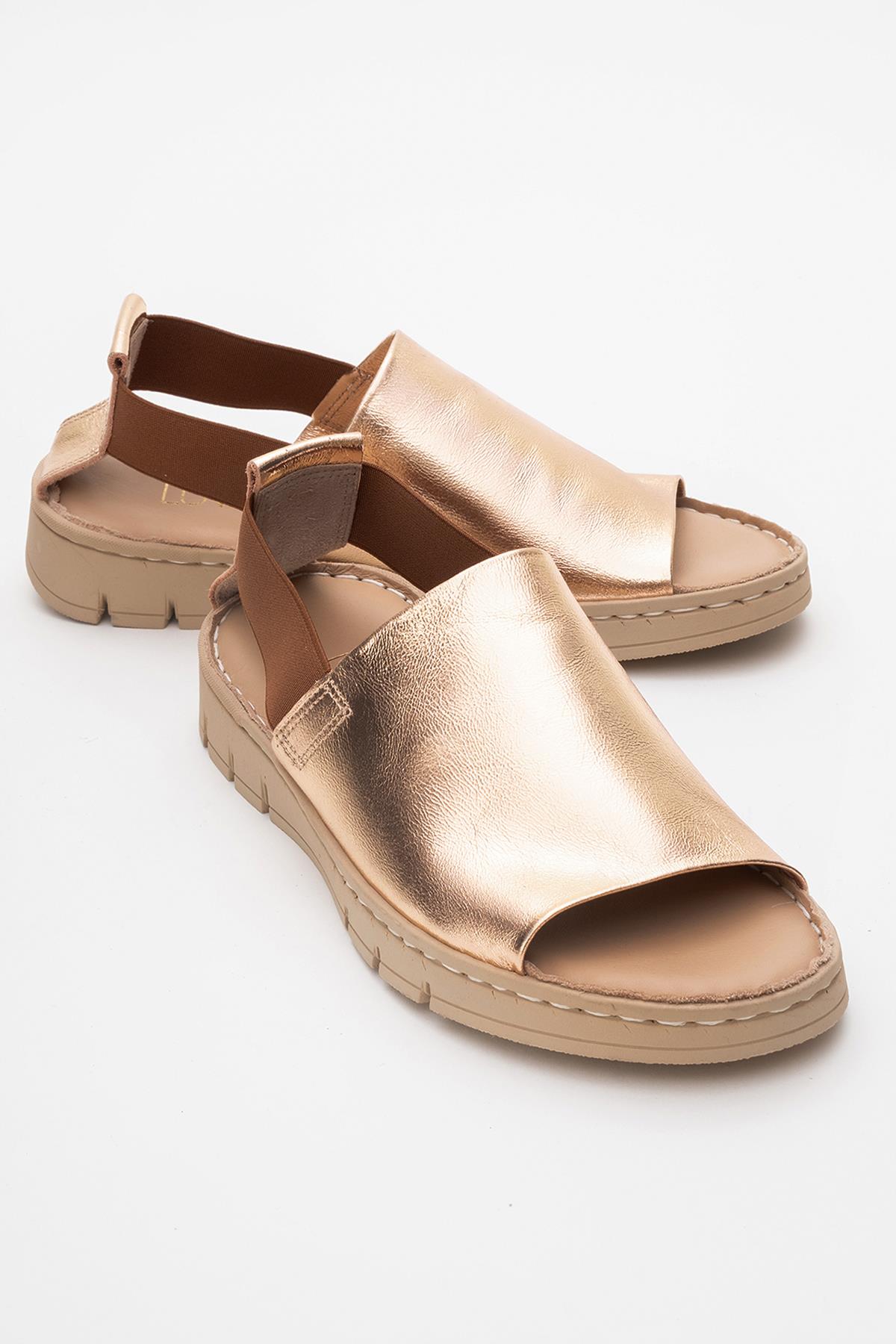 Londoi - Golden Elastic Strap Leather Sandal – front three-quarter view showing leather, gold, Vowalisse