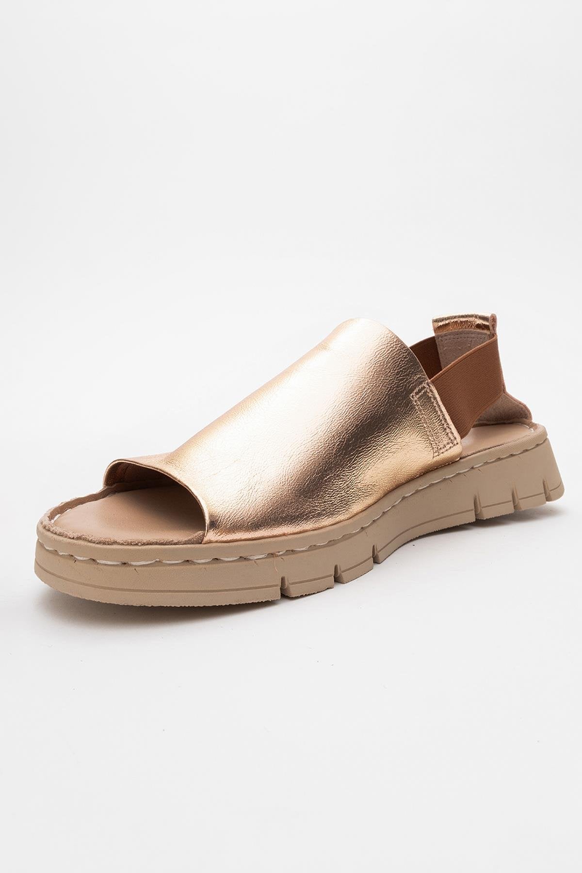 Londoi - Golden Elastic Strap Leather Sandal – heel view showing leather, gold, Vowalisse