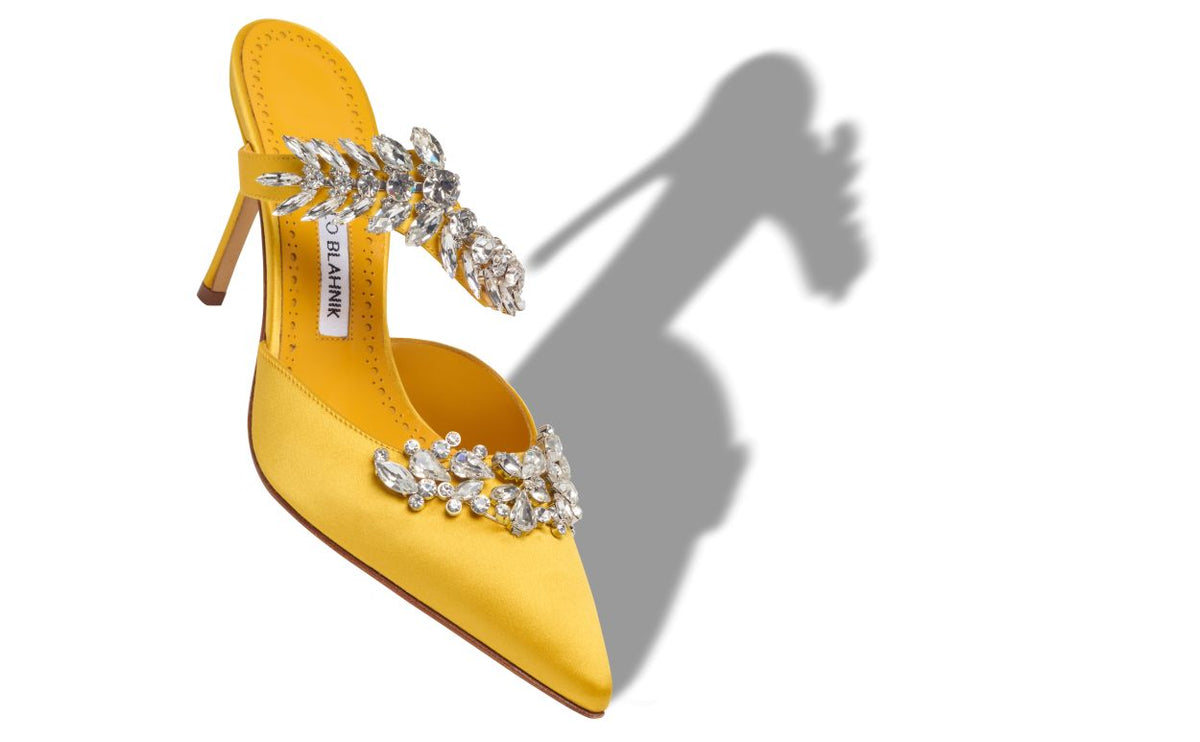 Seraphina Pearl Yellow Crystal Embellished Mules – front three-quarter view showing yellow crystal embellished, pointed toe…