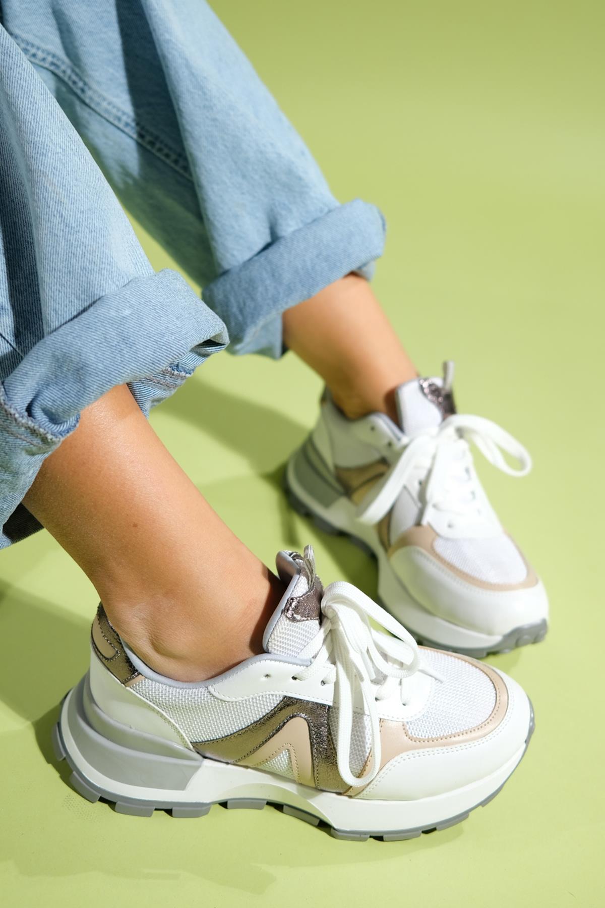 Calm - White Platinum Sneaker – side view showing leather, white, Vowalisse