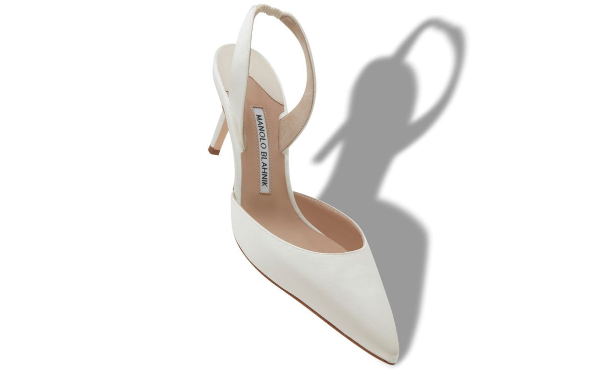 Evangeline Dawn White Slingback Slingbacks – front three-quarter view showing white slingback, pointed toe, satin…