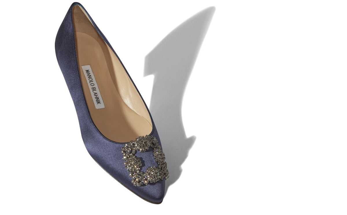 Leonora Bloom Blue Jewel Buckle Pumps – front three-quarter view showing blue jewel buckle, crystal buckle, almond toe…