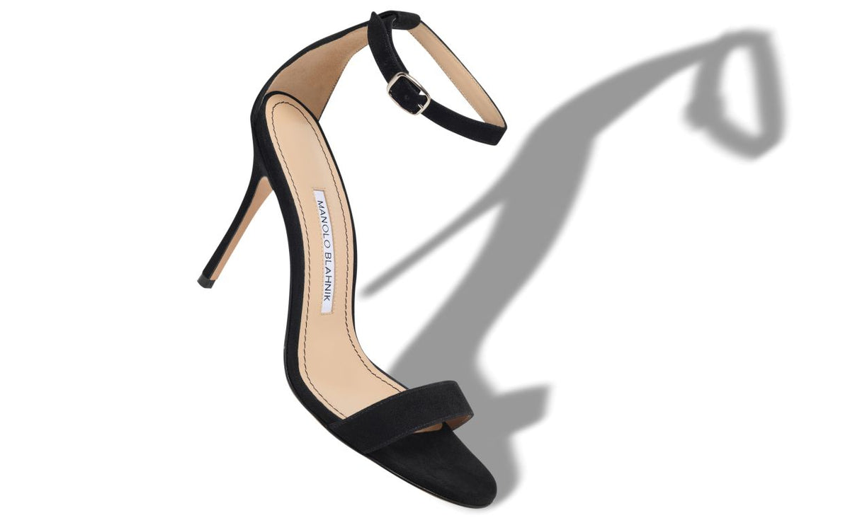 Celeste Pearl Black Ankle Strap Ankle-Strap Shoes – front three-quarter view showing black ankle strap, open toe, suede…