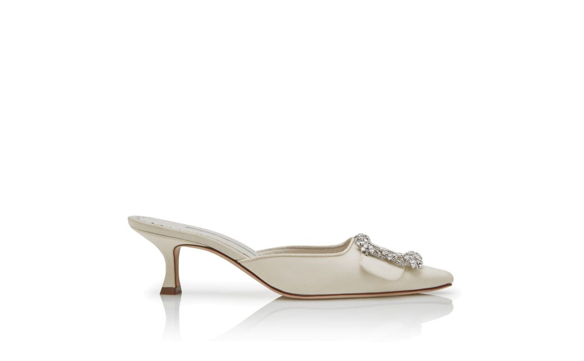 Delphine Bloom White Jewel Buckle Mules – side profile showing white jewel buckle, crystal buckle, almond toe, Vowalisse