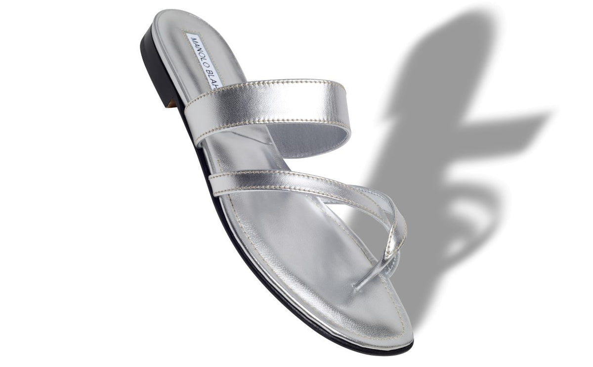 Anastasia Jewel Silver Crossover Mules – front three-quarter view showing silver crossover, open toe, nappa leather…